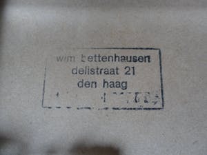 Wim Bettenhausen - Ingekleurde ets in preegdruk. Titel, "kermis aan het Malieveld". kopen? Bied vanaf 70!