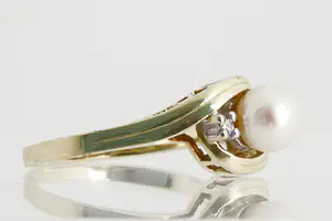 Acheter72 - Elegante 14 karaats geel-gouden dames  ring met parel en diamant (achtkant)? Enchérissez de 80!