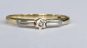 14 kt gouden solitair ring met diamantje kopen? Bied vanaf 100!