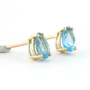 14k rood gouden oorbellen bezet met topaas totaal circa 1,20 ct kopen? Bied vanaf 120!