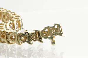 60- Chique geel-goud (14krt) & diamanten (2 ct) zg. slinger of guirlande armband kopen? Bied vanaf 1120!