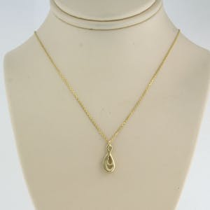 14k gouden collier met hanger bezet met briljant geslepen diamant tot 0.05ct kopen? Bied vanaf 1!