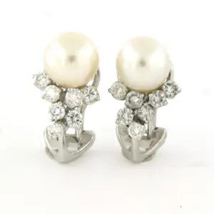 18k witgouden oorclips met parel en briljant geslepen diamant 0.50ct kopen? Bied vanaf 650!