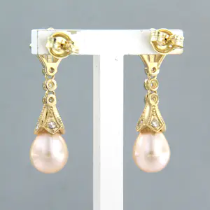 14k geel gouden oorhangers met parel en single cut geslepen diamant 0.34 ct kopen? Bied vanaf 375!