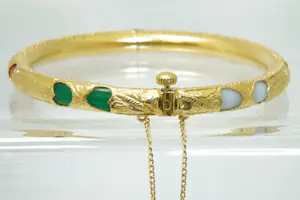 21 - Gedeeltelijk 20 karaats geelgouden armband met kunststof kern kopen? Bied vanaf 720!