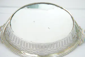 37 - 2e geh. Zilveren ajour gezgd ovalen Bonbon-mandje met parelrand en strikken kopen? Bied vanaf 190!