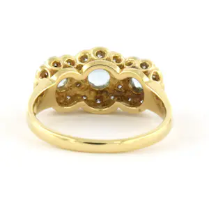 18k bicolour gouden ring met topaas en briljant geslepen diamant tot. 0.30ct kopen? Bied vanaf 650!