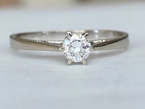 18 karaat witgouden ring met diamant ca  0.23 ct kopen? Bied vanaf 350!