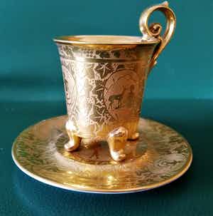 Antiek kopje en schoteltje Karlsbader 1921 goudgravuur verkocht voor € 1!