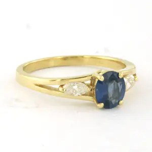 Acheter18k gouden ring met saffier tot. 0.88ct en marquise geslepen diamant tot.0.20ct? Enchérissez de 685!