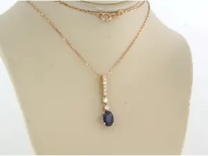14k gouden collier met hanger bezet met saffier en briljant geslepen diamant kopen? Bied vanaf 350!