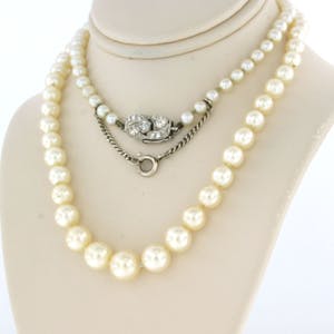18k gouden art deco slot bezet met oud slijsel diamanten aan een parelcollier kopen? Bied vanaf 400!