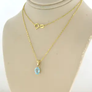 14k geel gouden collier met hanger bezet met blauwe topaas tot. 0,90ct kopen? Bied vanaf 130!