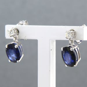 18k witgouden oorknoppen met saffier tot. 2,15ct en diamant 0.12 ct kopen? Bied vanaf 420!