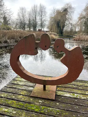 Albrecht Genin - prachtig abstract beeld van twee figuren in ijzer kopen? Bied vanaf 1500!