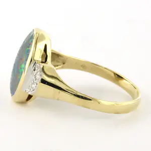 14k bicolour gouden ring met opaal en single cut geslepen diamant tot. 0.05ct kopen? Bied vanaf 485!