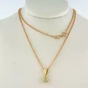 14k gouden collier en solitair hanger met Bolsjewiek geslepen diamant kopen? Bied vanaf 480!