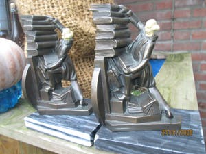 Brons (Onbekend) - Uniek brons boekensteun met aardewerk hoofdje 2 stuks kopen? Bied vanaf 75!