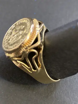 18 karaats geelgouden muntring kopen? Bied vanaf 490!