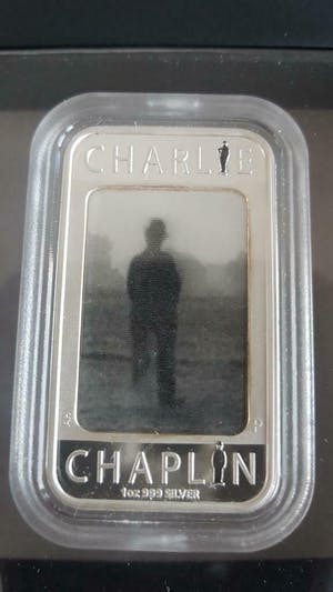 Curiosa - Charlie Chaplin 100 YEARS OF LAUGHTER 1 oz .999 Silver Lenticular Coin Bar kopen? Bied vanaf 75!