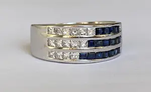 18 karaat witgouden band ring met 0,30 karaat diamanten en saffieren kopen? Bied vanaf 700!