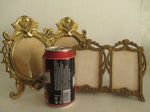 Curiosa - Twee bronzen/koperen dubbele fotolijsten onder glas kopen? Bied vanaf 50!