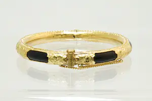 6 - grote Surinaamse 14Krt geel gouden armband met zwarte kunststof kern kopen? Bied vanaf 450!