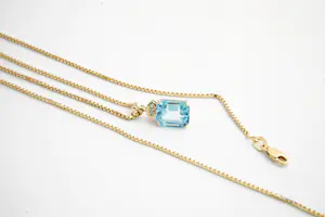 126- Fijn 18 krt  gouden collier en 14 krt gouden diamant/aquamarijn hanger kopen? Bied vanaf 240!