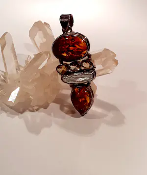 Grote zilveren Hanger met facet geslepen citrien en Amber en streepparel kopen? Bied vanaf 80!