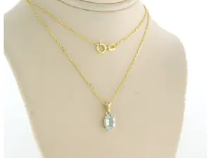 14k geel gouden collier met hanger bezet met blauwe topaas tot. 0,90ct kopen? Bied vanaf 130!