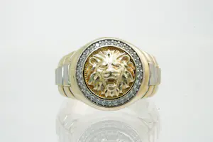 Acheter53 - Fraai gedetailleerde 14kt bi-color gouden Leeuwenkop ring? Enchérissez de 370!