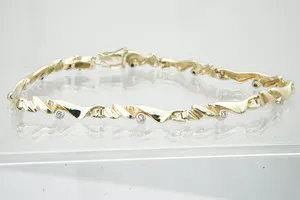 Chique gouden (14krt) & diamanten (0.10ct) "Slinger / Guirlande" armband kopen? Bied vanaf 230!