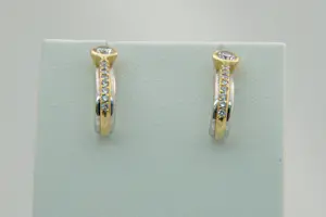 74- Fraaie set bicolor 18krt goud & diamanten oorstekers -ca.0.40ct diamant kopen? Bied vanaf 280!