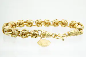79 - Zware 20 krt geel-gouden open Konings schakel armband -met grote harthanger kopen? Bied vanaf 1560!
