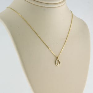 14k gouden collier met hanger bezet met briljant geslepen diamant tot. 0,07ct kopen? Bied vanaf 1!