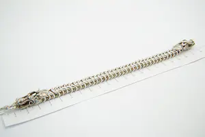 74 - Zware en aparte 2e gehalte zilveren dragon of draken armband kopen? Bied vanaf 90!