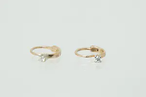 79 - 1 paar charmante 14krt rosé-gouden oorclips met 0.15ct diamant kopen? Bied vanaf 80!