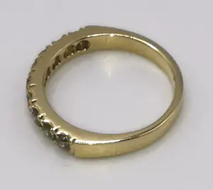 Gouden ring met 9 diamanten kopen? Bied vanaf 290!