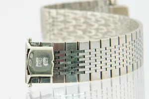 Vintage jaren 60 wit-gouden 14 krt unisex Armband - flexibele gematteerde band kopen? Bied vanaf 1360!