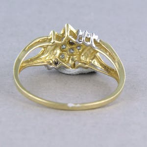 14k bicolor gouden ring bezet met briljant geslepen diamanten tot. 0,13ct kopen? Bied vanaf 1!
