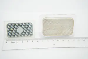 75 - Twee zilveren baartjes van Silver Towne en Sunshine Minting in Plastic kopen? Bied vanaf 260!