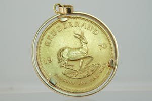 1239-  Gouden (14krt) montuur met originele 1970 Krugerrand munt - Zuid Afrika kopen? Bied vanaf 1260!