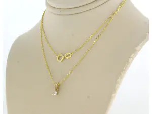 14k geelgouden collier met hanger bezet met briljant geslepen diamant 0,10ct kopen? Bied vanaf 170!