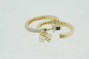 21- Fraaie set 18krt geel goud & diamanten oorstekers - 0.30ct briljant kopen? Bied vanaf 320!
