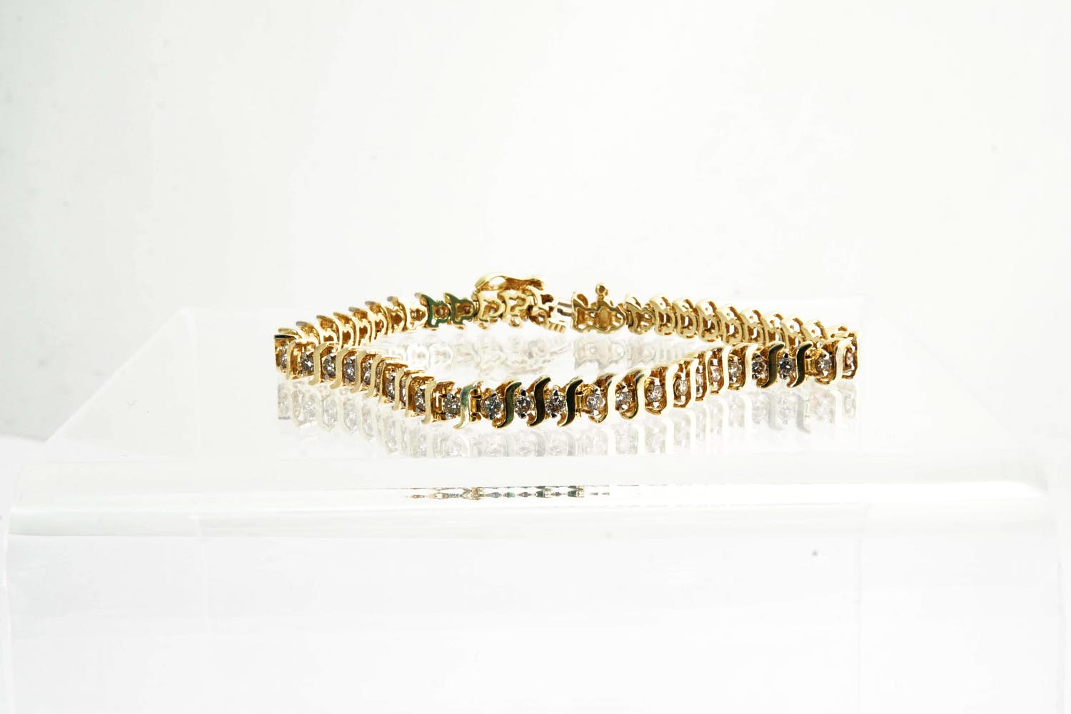 60- Chique geel-goud (14krt) & diamanten (2 ct) zg. slinger of guirlande armband kopen? Bied vanaf 1120!