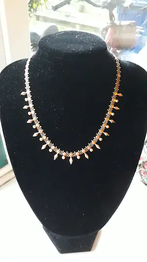 AcheterGouden collier? Enchérissez de 650!
