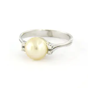 18k wit gouden ring bezet met parel en single cut geslepen diamant tot. 0.02ct kopen? Bied vanaf 240!