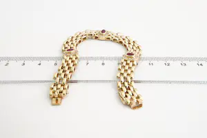 99- 18 karaats geel-gouden dames armband gezet met rode edelsteen kopen? Bied vanaf 770!