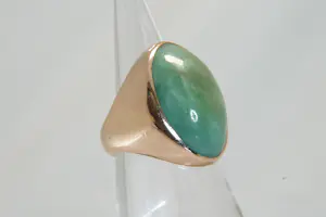 77 - Beneden wettelijk roségoud gehalte ring met ovale groene steen kopen? Bied vanaf 280!