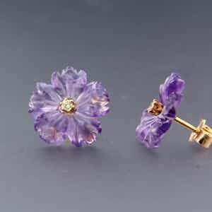18K Goud - rood gouden oorknoppen bezet met amethist en diamant verkocht voor € 160!